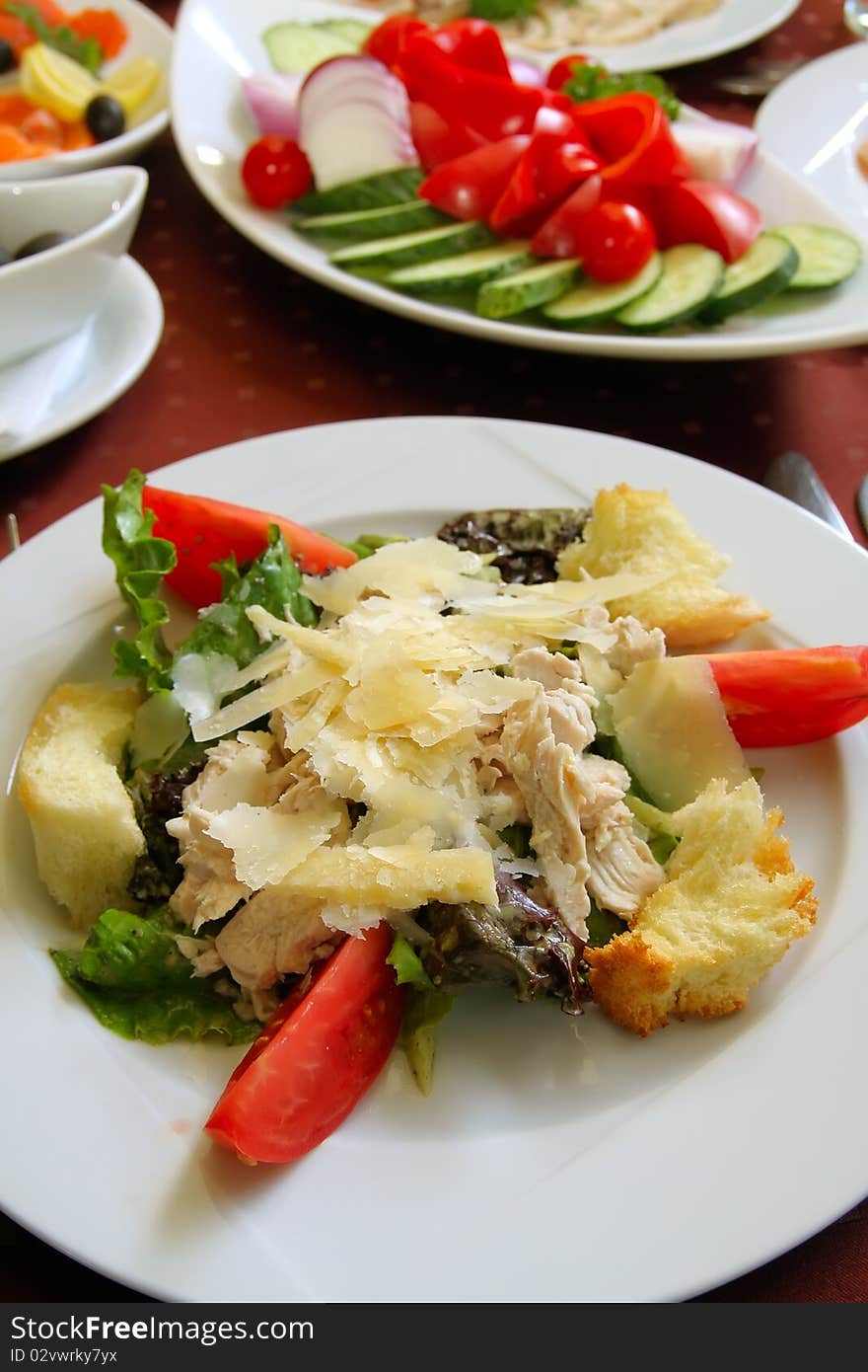 Fresh delicious appetizer. Cheese, meat with vegetables. Fresh delicious appetizer. Cheese, meat with vegetables