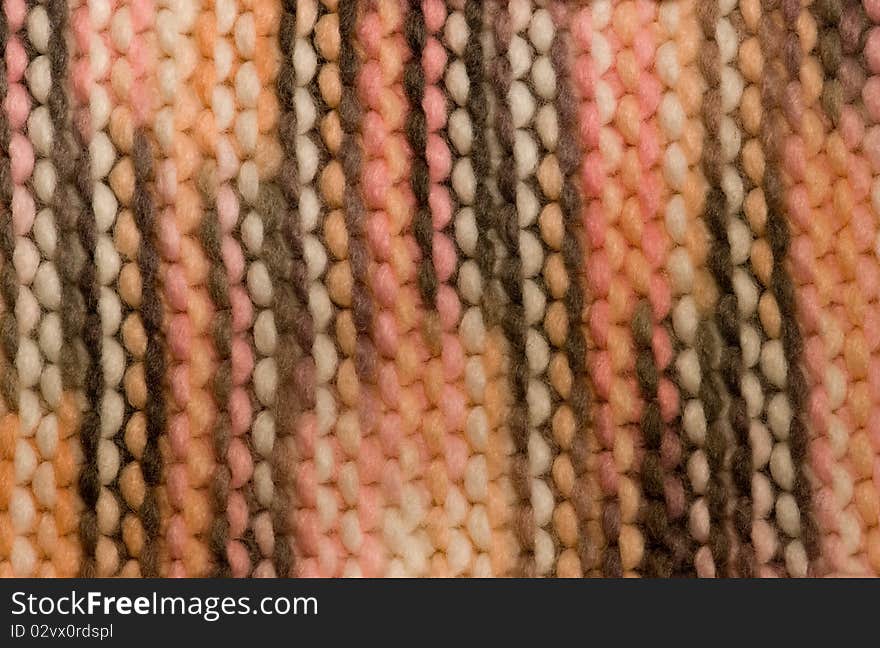 Pink knitted stripped textured background. Pink knitted stripped textured background