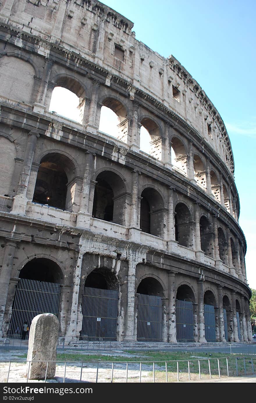 Image of the Coliseum, roman Colosseum, the most famous amphitheatre around the world. It is in the center of the city of Rome. It has been estimated than about 500.000 people and over a million wild animals died in the Colosseum games.