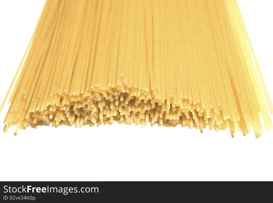 Bundle of spaghetti isolated over white background. Bundle of spaghetti isolated over white background