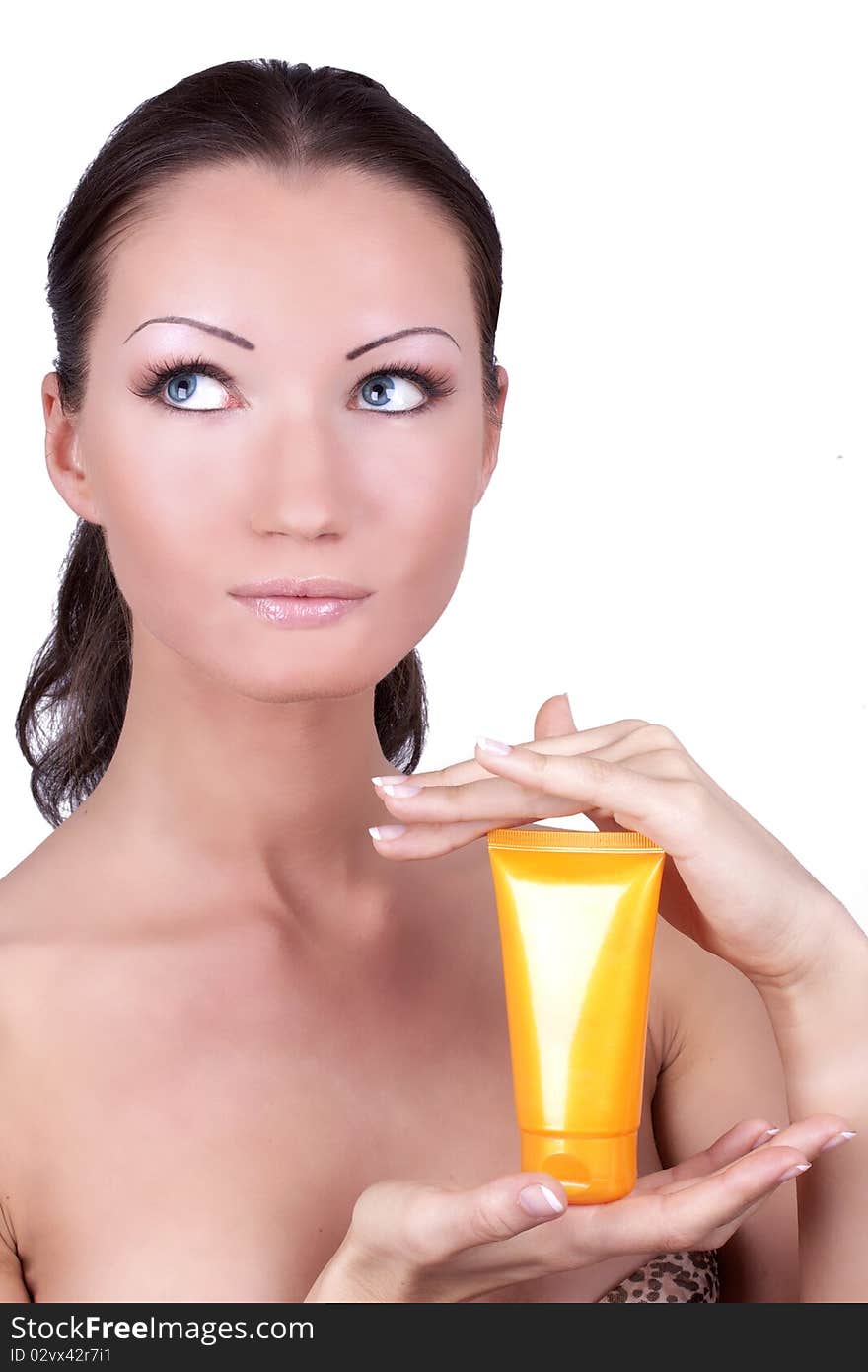 Attractive woman with sun protection cream in her hands, portrait on white