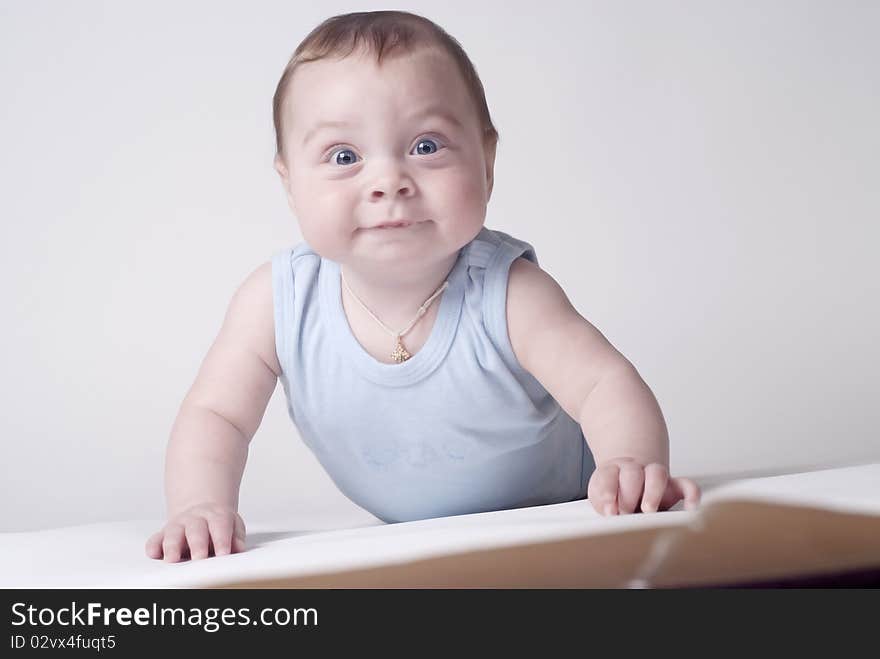 Happy baby  on a white background