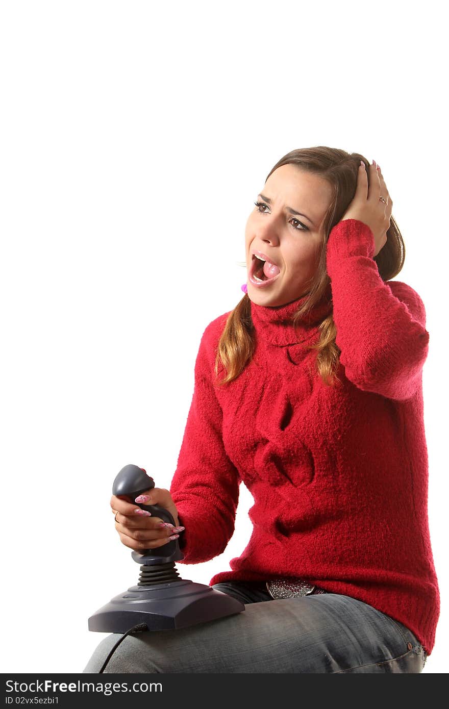 Girl play computer game with helping of a joystick. Girl play computer game with helping of a joystick