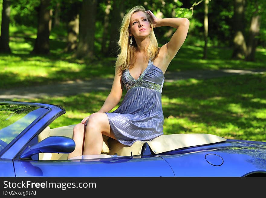 Woman Sitting In A Car