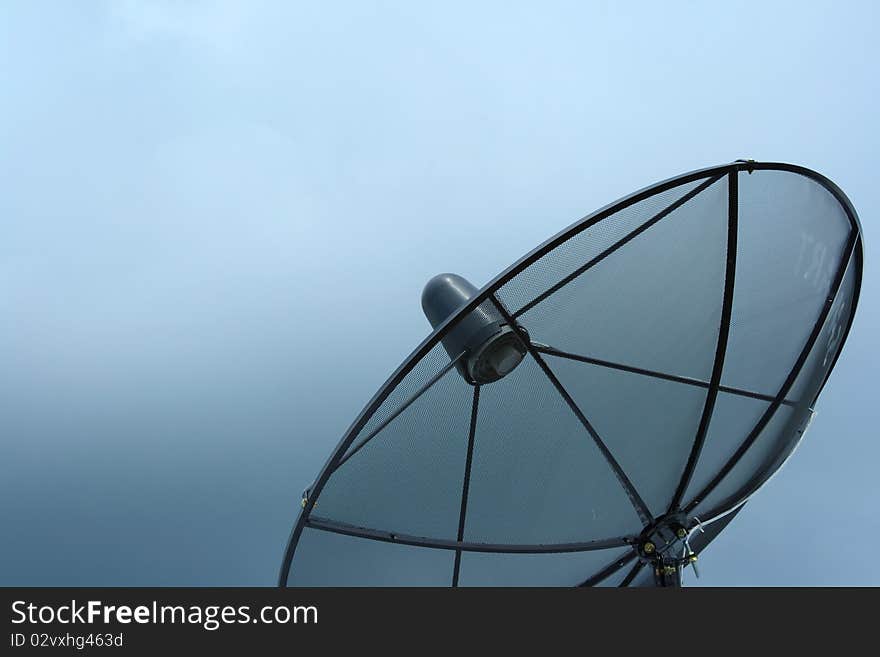 Satellite dish blue sky background