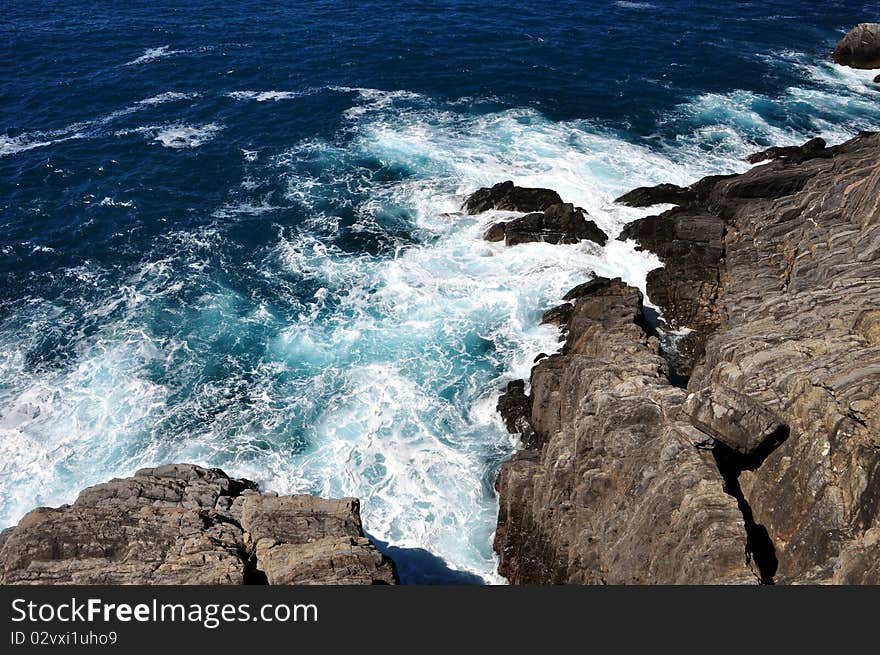 Big waves smash into rocks,  Mediterannean Sea. Big waves smash into rocks,  Mediterannean Sea