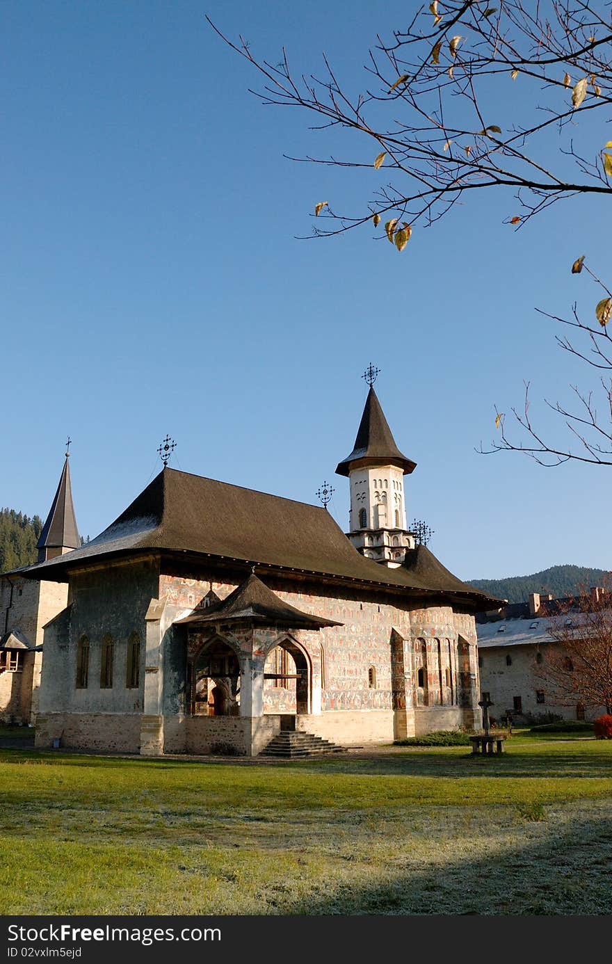 Exterior of monastery and trees in fall season. Exterior of monastery and trees in fall season