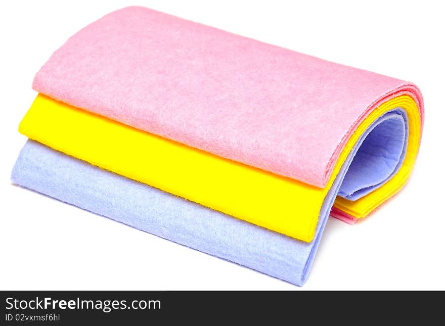 Pile of various multicolor microfibre cloths on white. Pile of various multicolor microfibre cloths on white