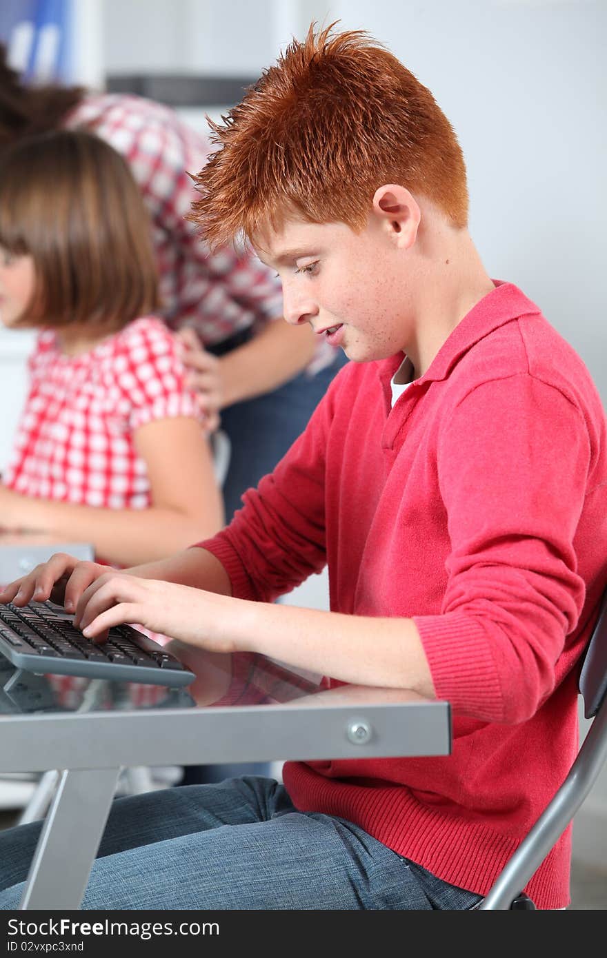 Children learning to use computer. Children learning to use computer