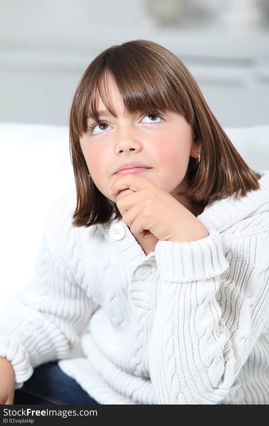 Little girl with thoughtful look