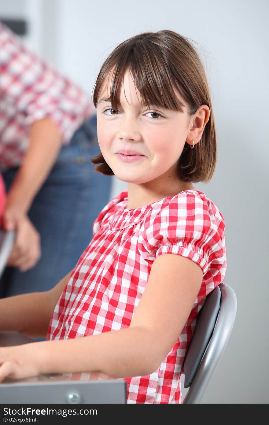 Shy little girl at school. Shy little girl at school