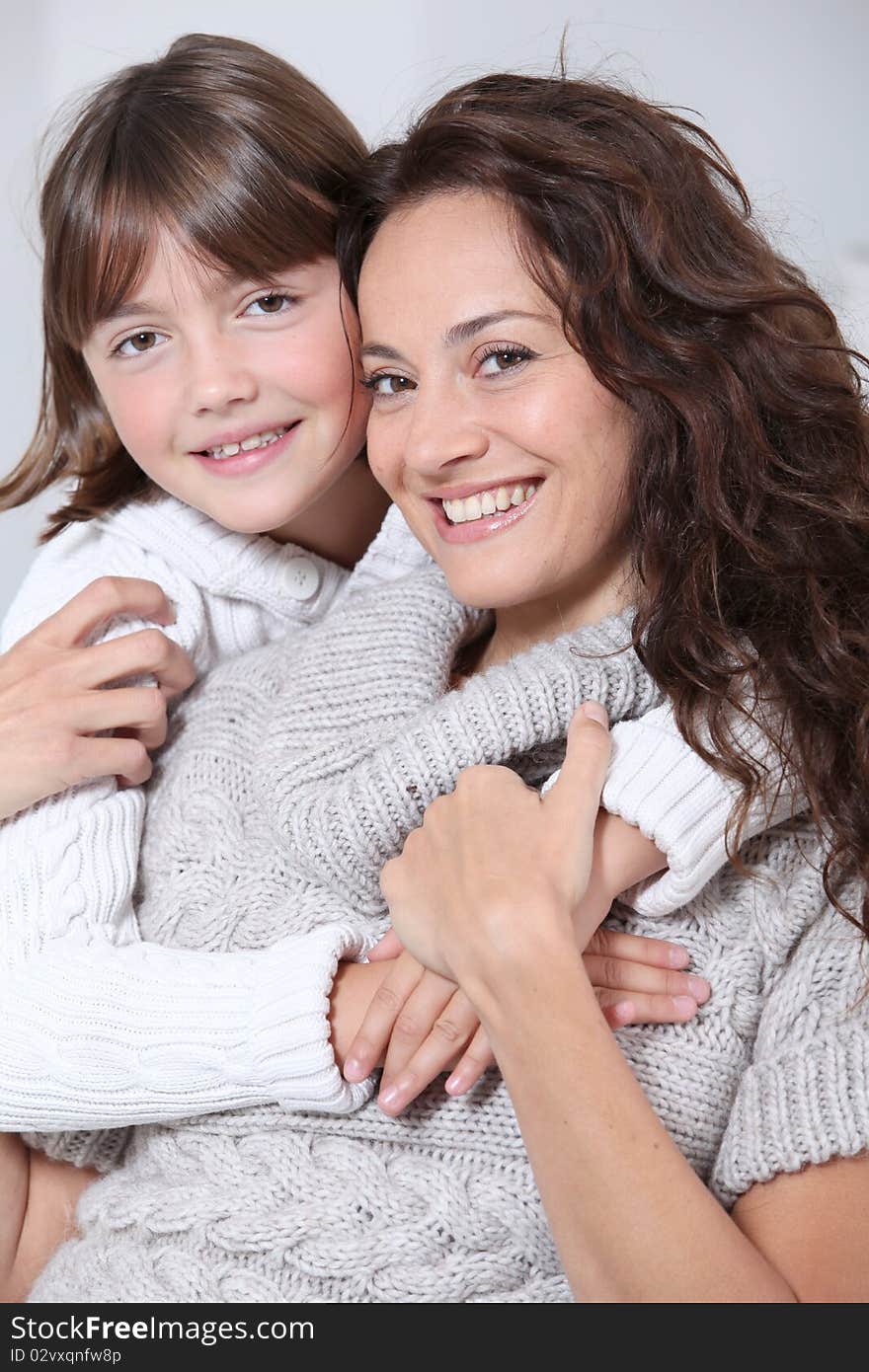 Woman and daughter at home. Woman and daughter at home