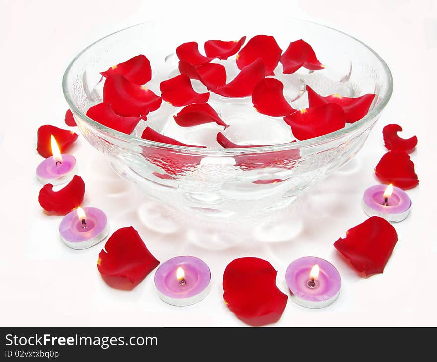 Spa lit candles rose flowers health-care treatment. Spa lit candles rose flowers health-care treatment