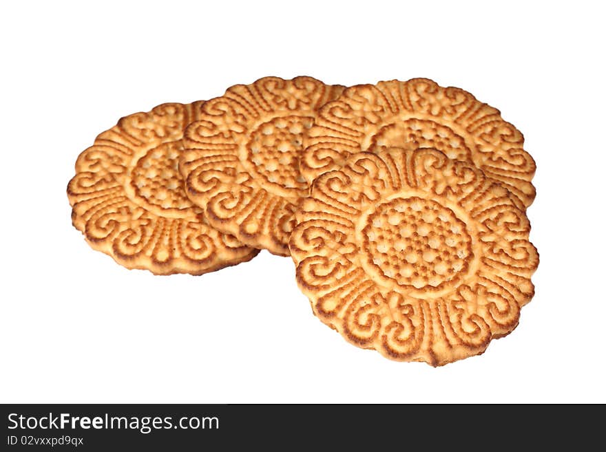 Four cookies with a pattern. Isolated on white background.