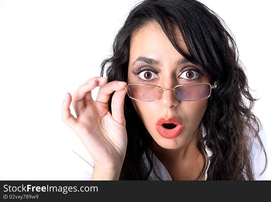 Surprised young lady in glasses isolated on white