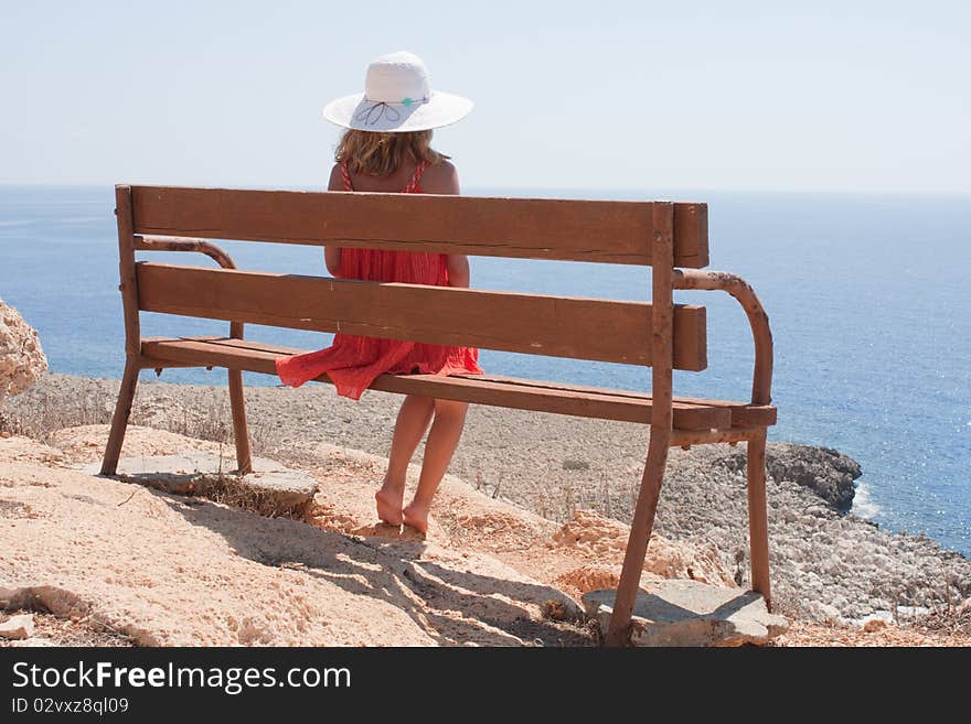 Woman sitting on a bench