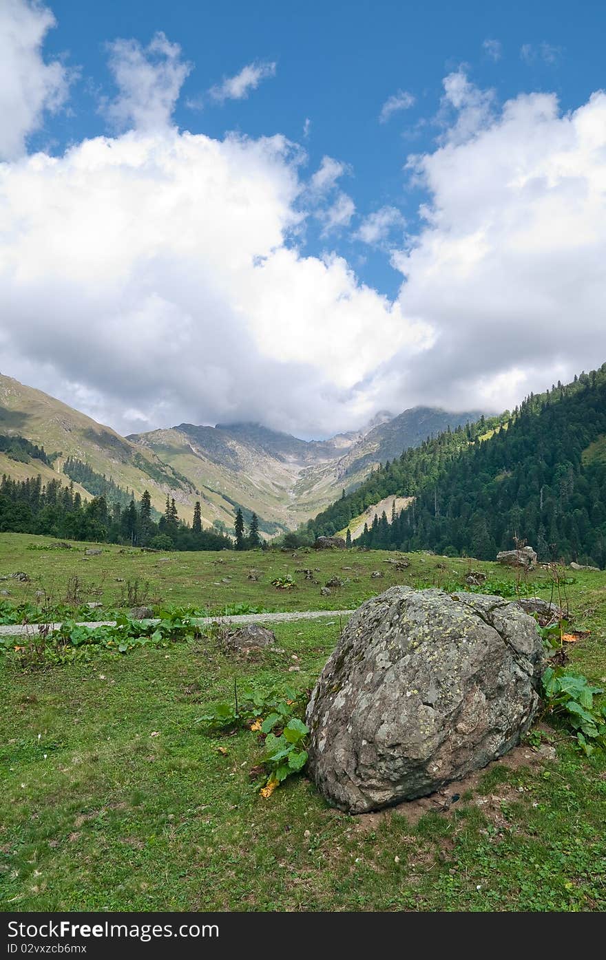 Picturesque valleys above lake Ritsa involve with the beauty and mineral sources of many tourists.Abkhazia. Picturesque valleys above lake Ritsa involve with the beauty and mineral sources of many tourists.Abkhazia.