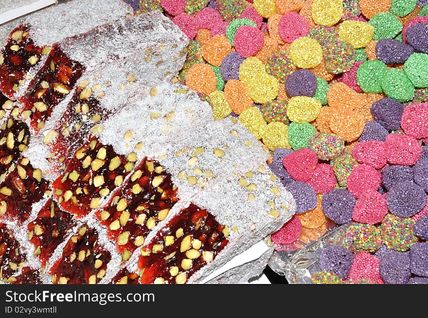 Colorful asian sweets  with nuts , close up. Colorful asian sweets  with nuts , close up