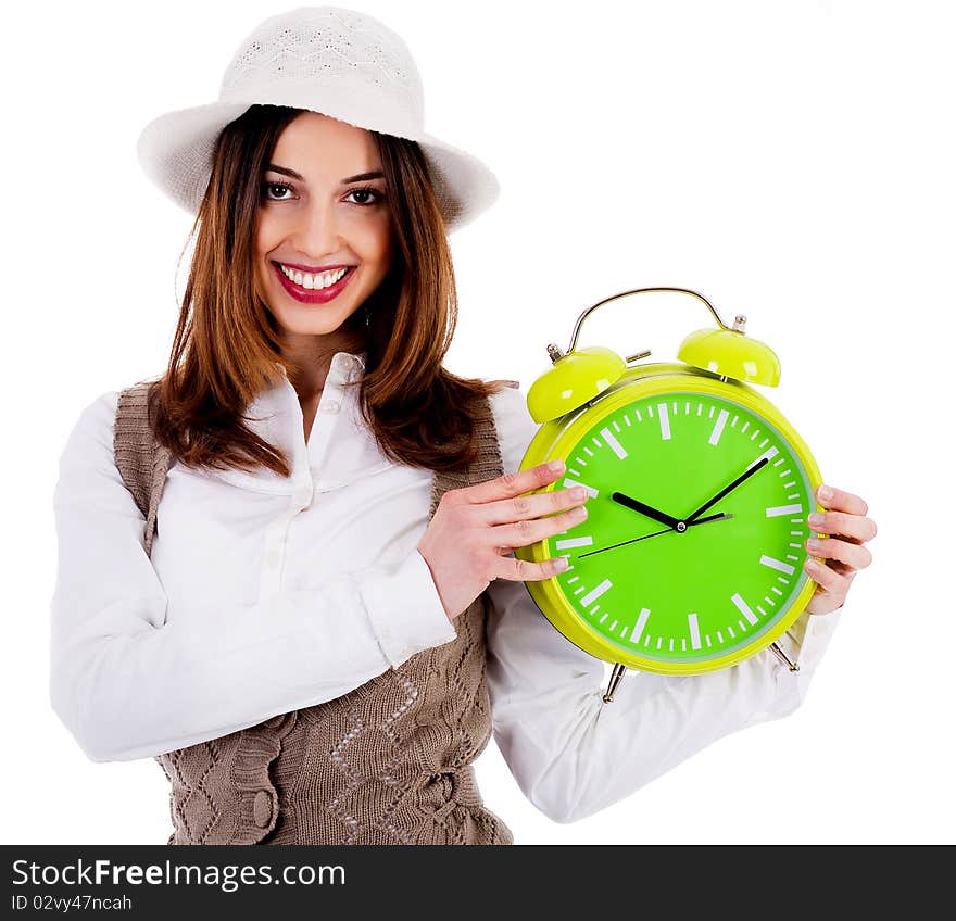 Portrait of stylish lady holding alarm clock on an isolated background