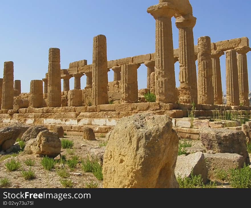 Side of ancient Greek temple of Juno in Valle dei templi near Agrigento, in Sicily, Italy, Europe;. Side of ancient Greek temple of Juno in Valle dei templi near Agrigento, in Sicily, Italy, Europe;