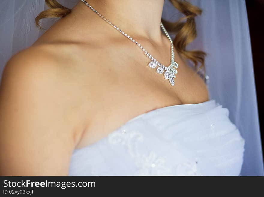 Adornment on neck of young bride