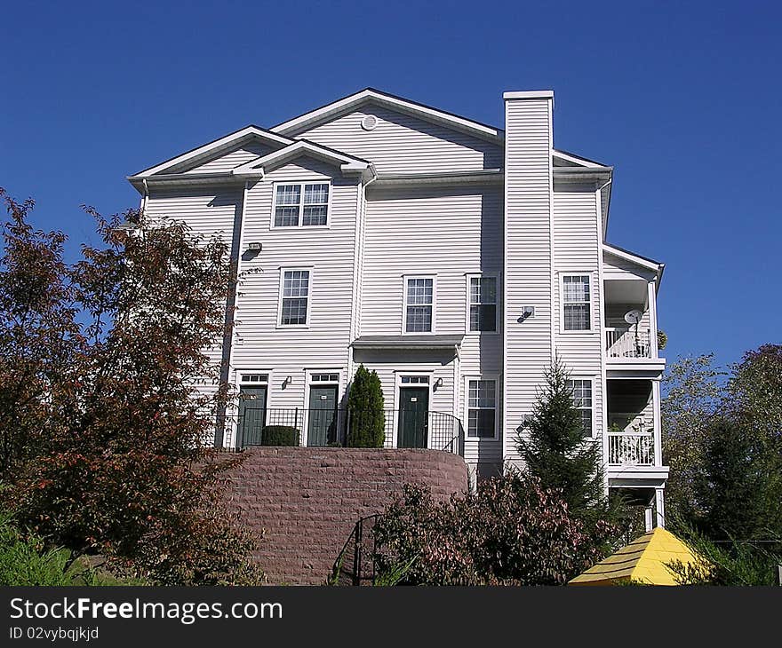 White wooden house in Tysons Corner near Washington DC, USA. White wooden house in Tysons Corner near Washington DC, USA