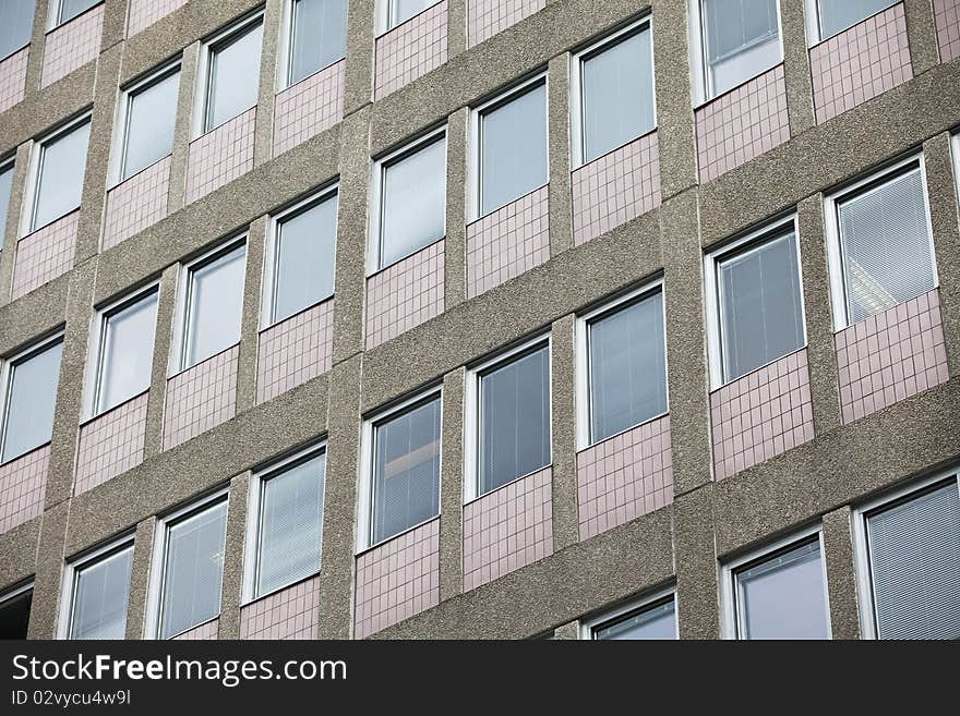 Several windows on a worn Building