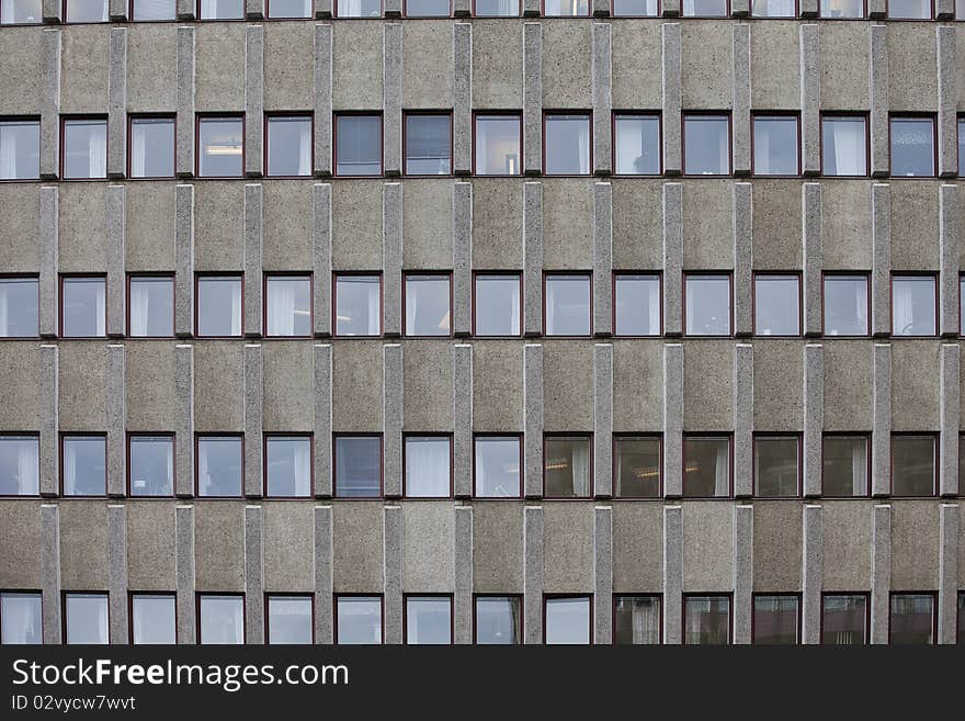 Several Windows on a worn building