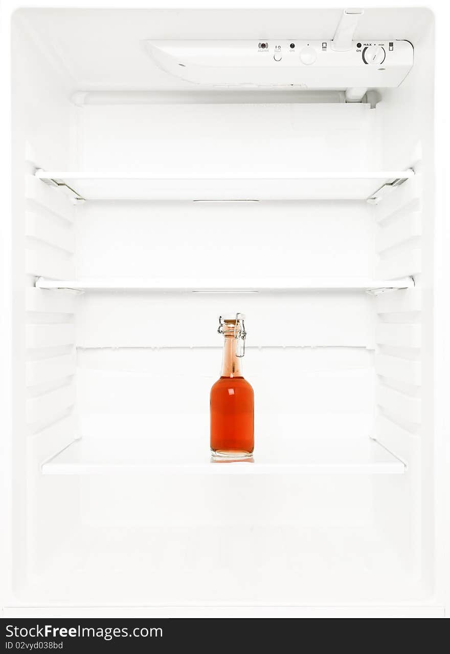 Lonely bottle in a fridge