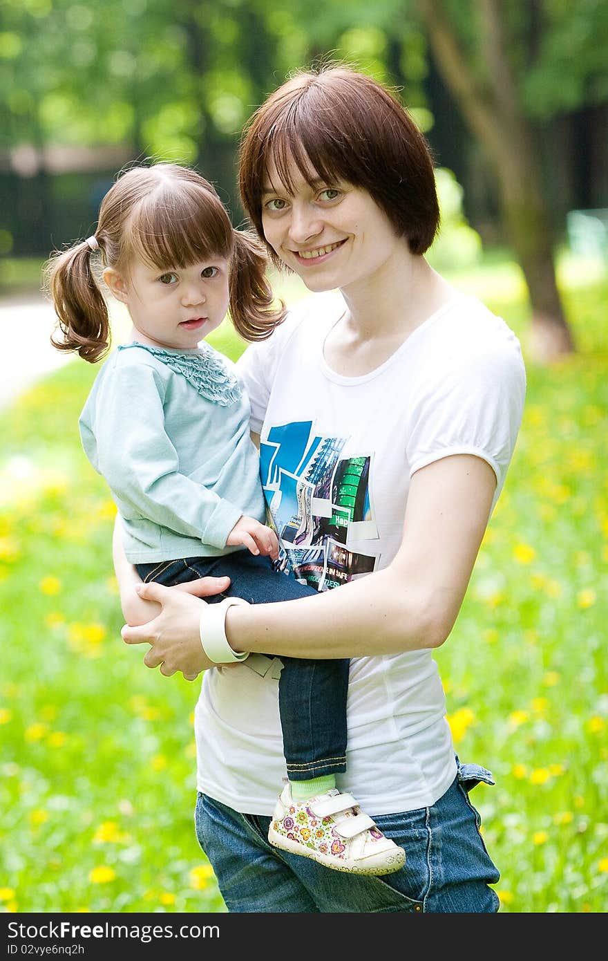 Mothers and son in park. Mothers and son in park