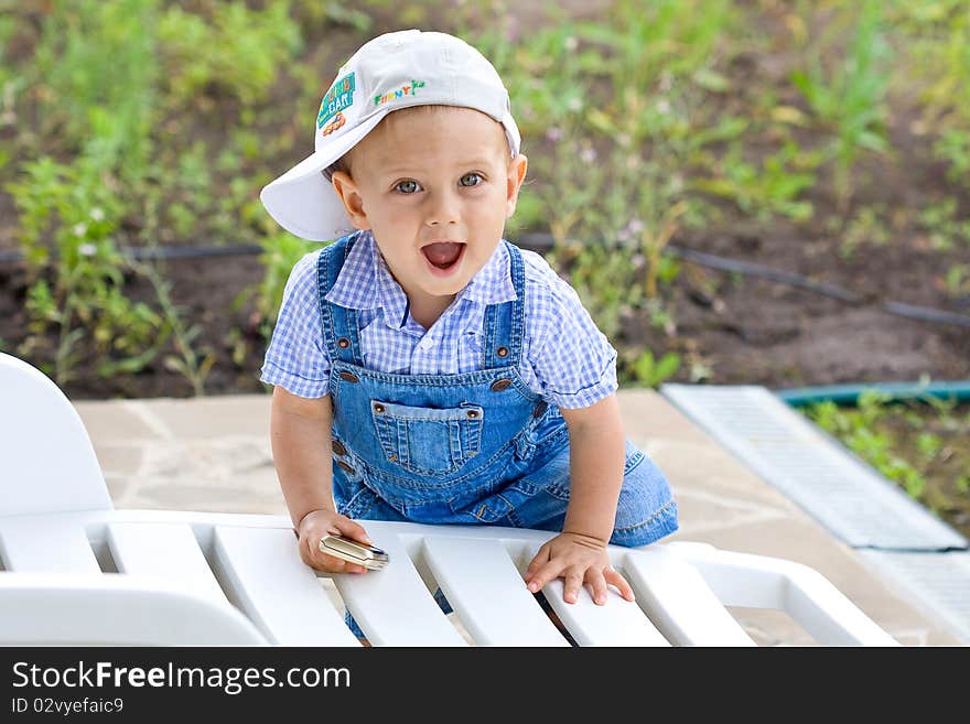 Happy child plays in park