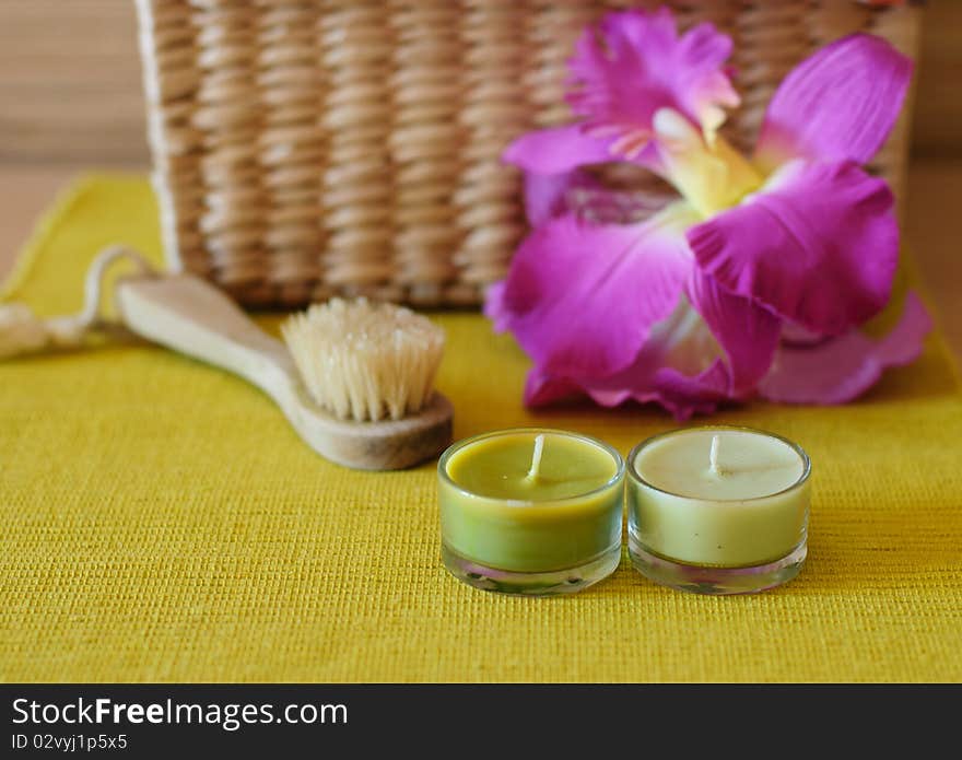 Essential  candle and flower in health spa for spa treatment.