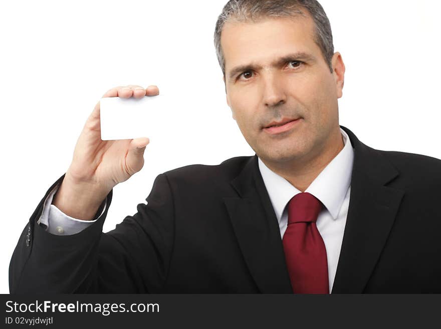 Businessman holding blank card