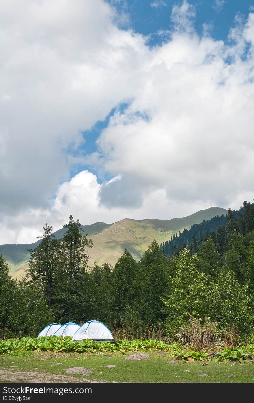 Picturesque valleys above lake Ritsa involve with the beauty and mineral sources of many tourists.Abkhazia. Picturesque valleys above lake Ritsa involve with the beauty and mineral sources of many tourists.Abkhazia.