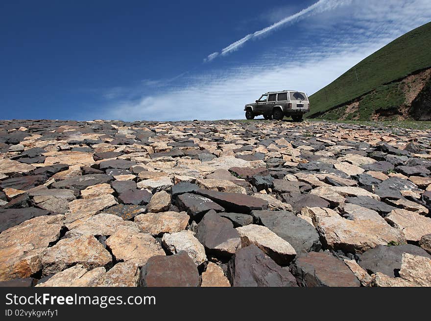 A jeep on a dam. A jeep on a dam