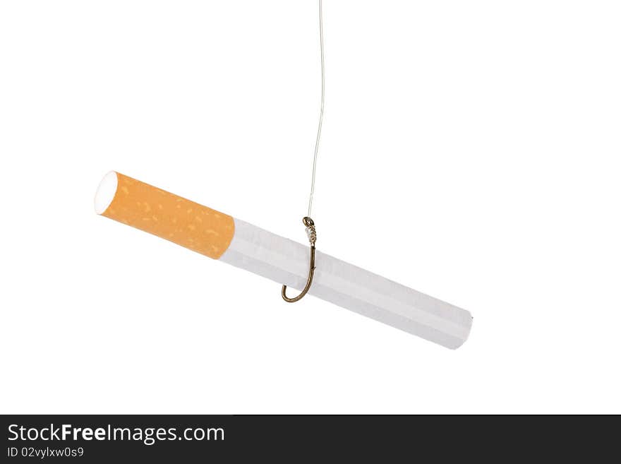 A filtered cigarette hooked to a fishing hook; addiction concept. A filtered cigarette hooked to a fishing hook; addiction concept.