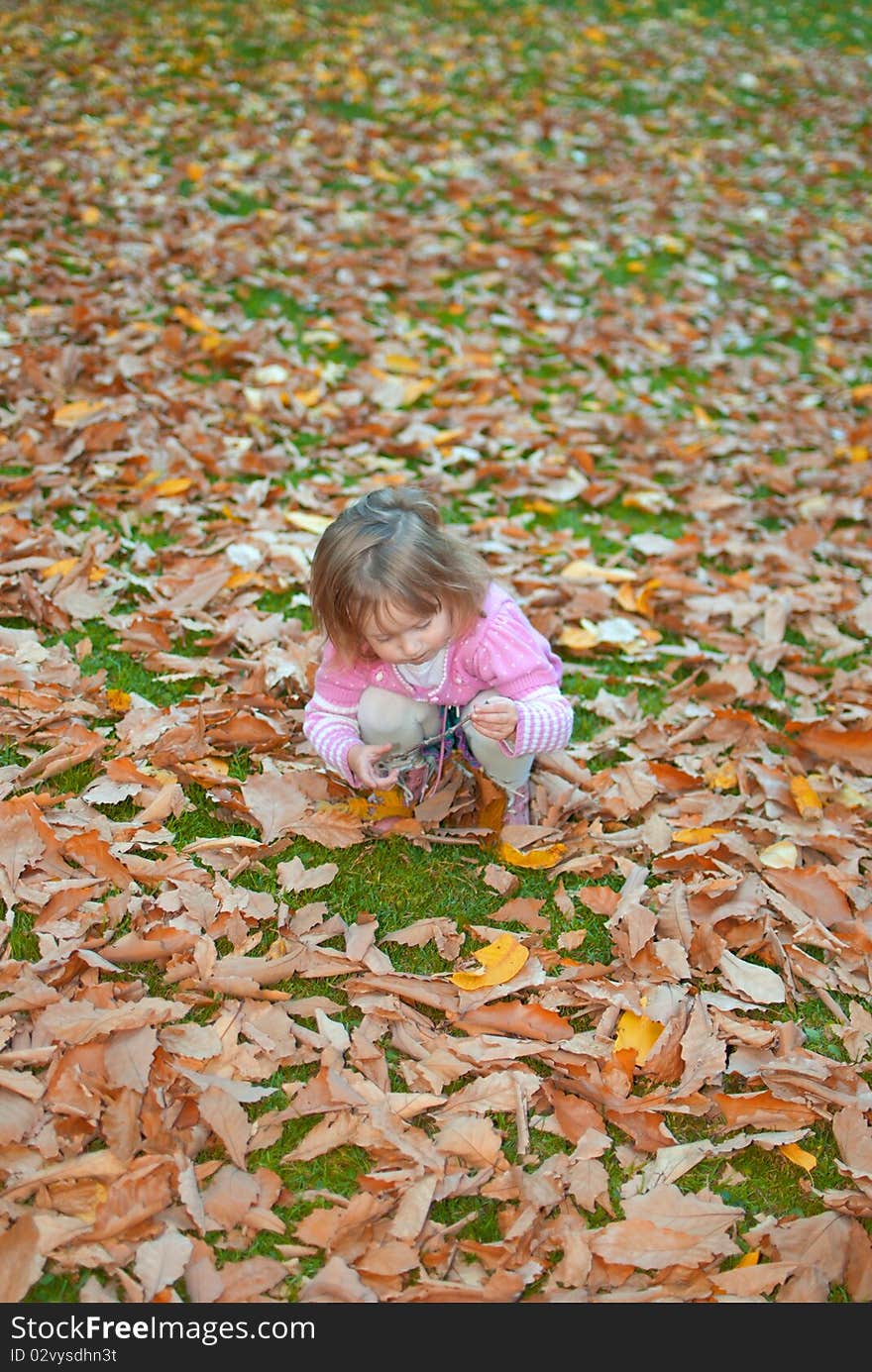 Girl In Autumn Park