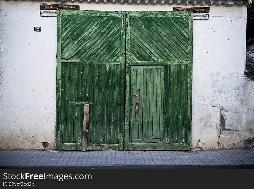 Old door in old street of shops