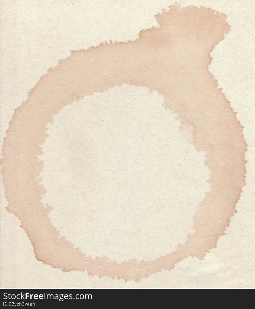 Round Coffee Stain On Textured Paper