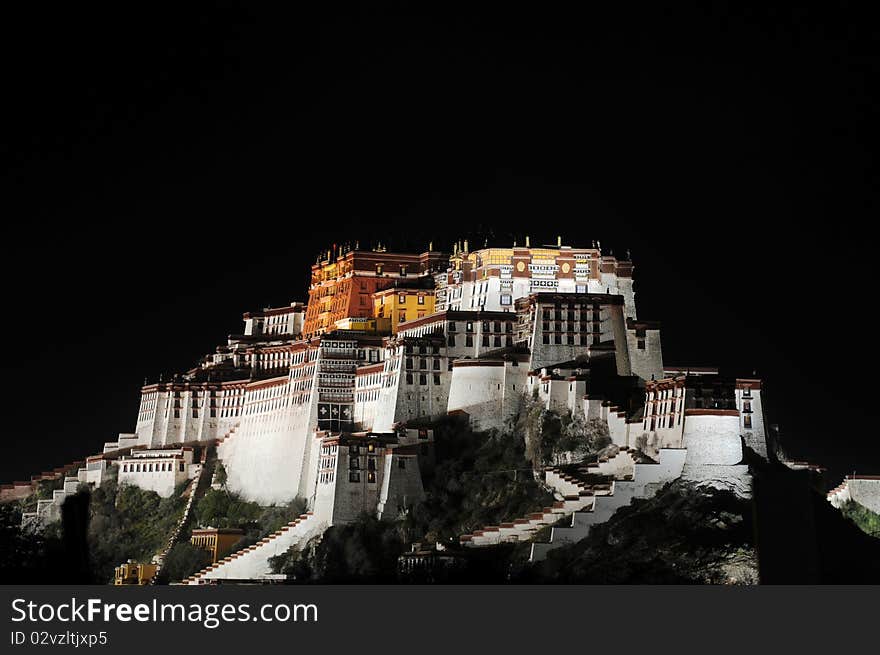 Night scenes of the famous Potala Palace in Lhasa, Tibet,isolated on a black background.