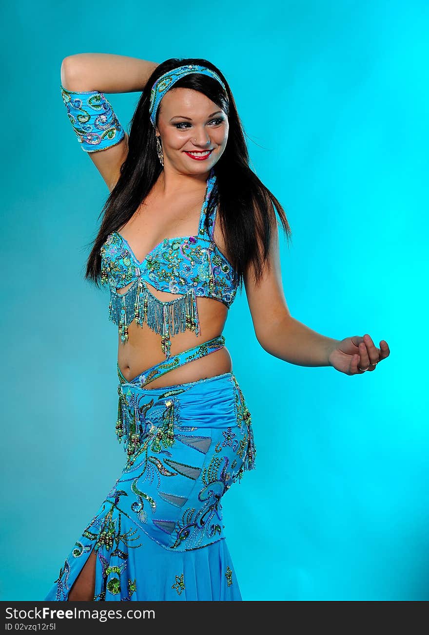 Beautiful sexy dancer woman in bellydance costume