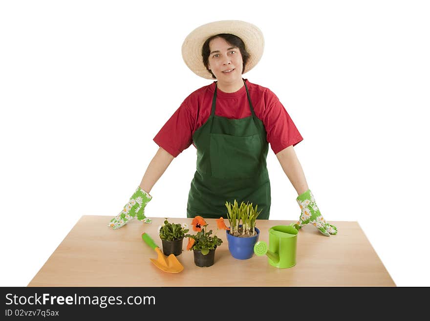 Woman gardener with garden tool isolated on white background.