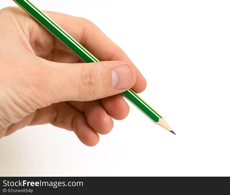 Hand holding a pencil on a white. Hand holding a pencil on a white