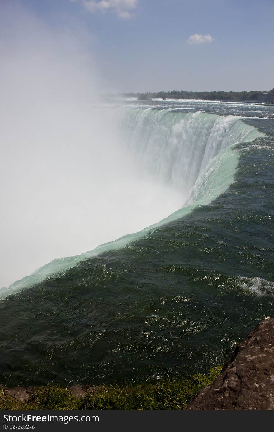 Water flowing over the edge of Horseshoe Falls, Niagara Falls, Canada. Water flowing over the edge of Horseshoe Falls, Niagara Falls, Canada.