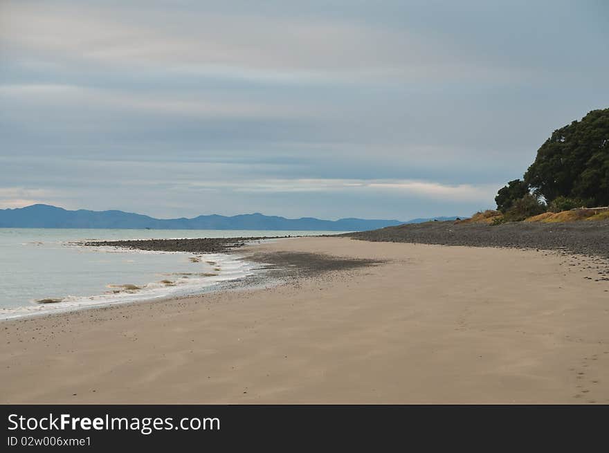 Kaiwa beach in the early morning before the sun is fully up, New Zealand. Kaiwa beach in the early morning before the sun is fully up, New Zealand