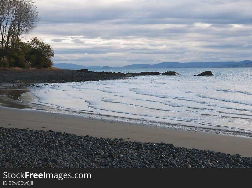 Dusk at Kaiaua beach south of Auckland in New Zealand. Dusk at Kaiaua beach south of Auckland in New Zealand