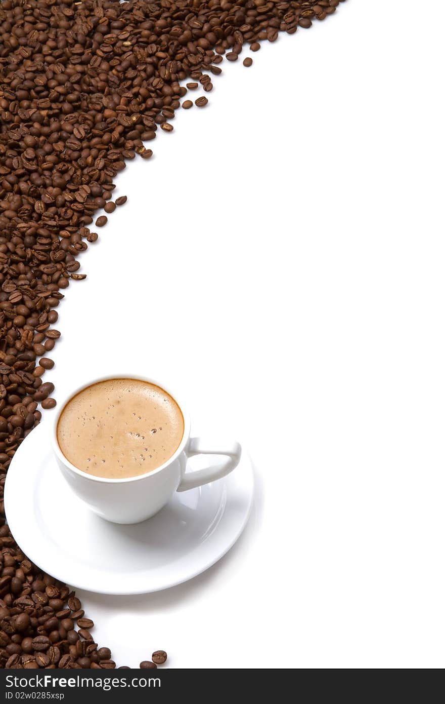 Coffee cup and grain on white background