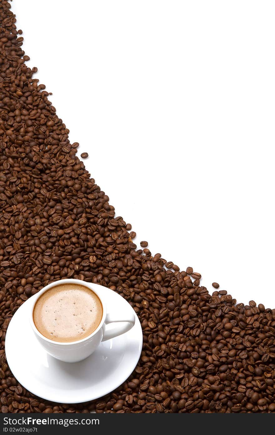 Coffee cup and grain on white background