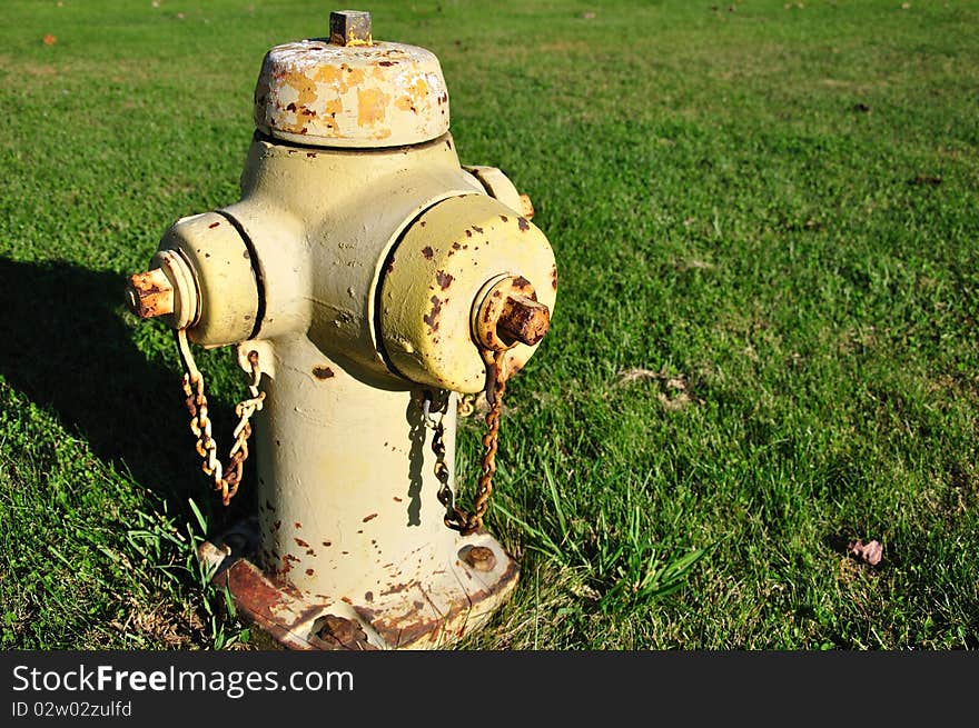 Fire hydrant with rust and chipped paint.