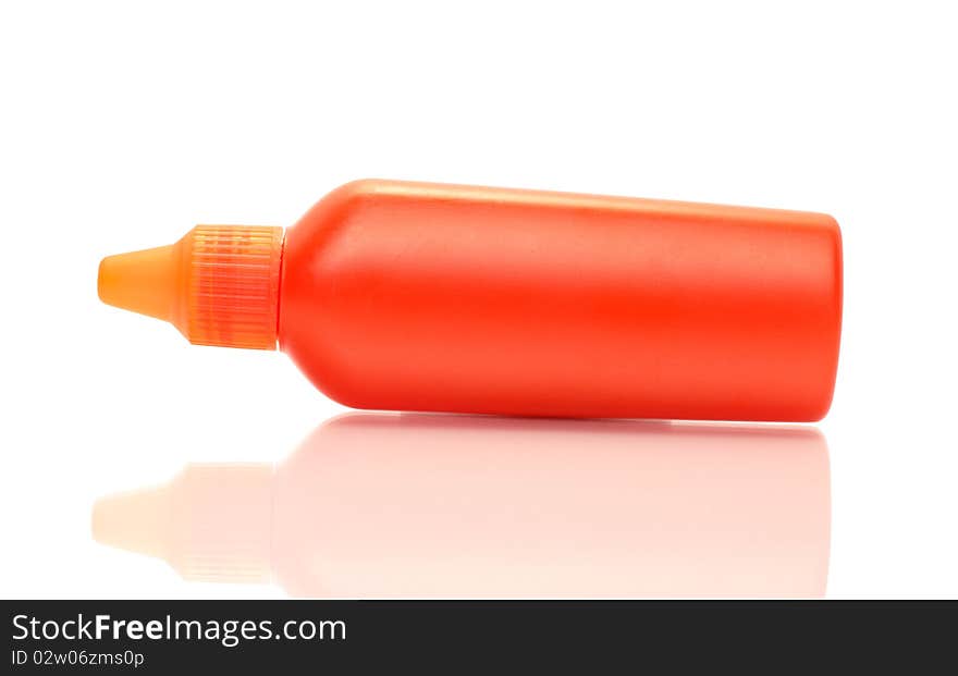 Orange plastic lotion container isolated on white background